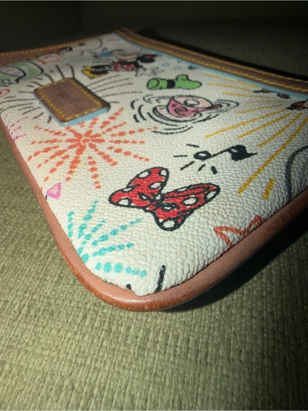 Disney Parks Sketch print wristlet by Dooney & Bourke